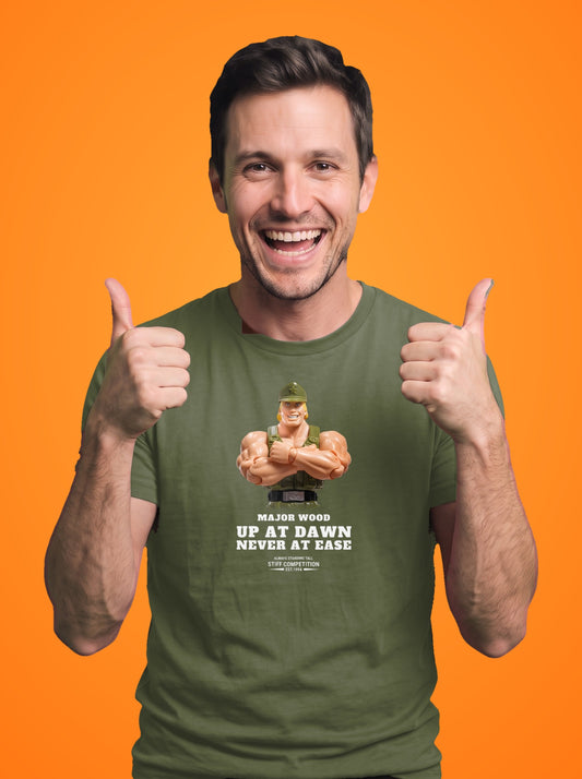 Man wearing the Major Wood Up At Dawn, Never At Ease t-shirt in military green