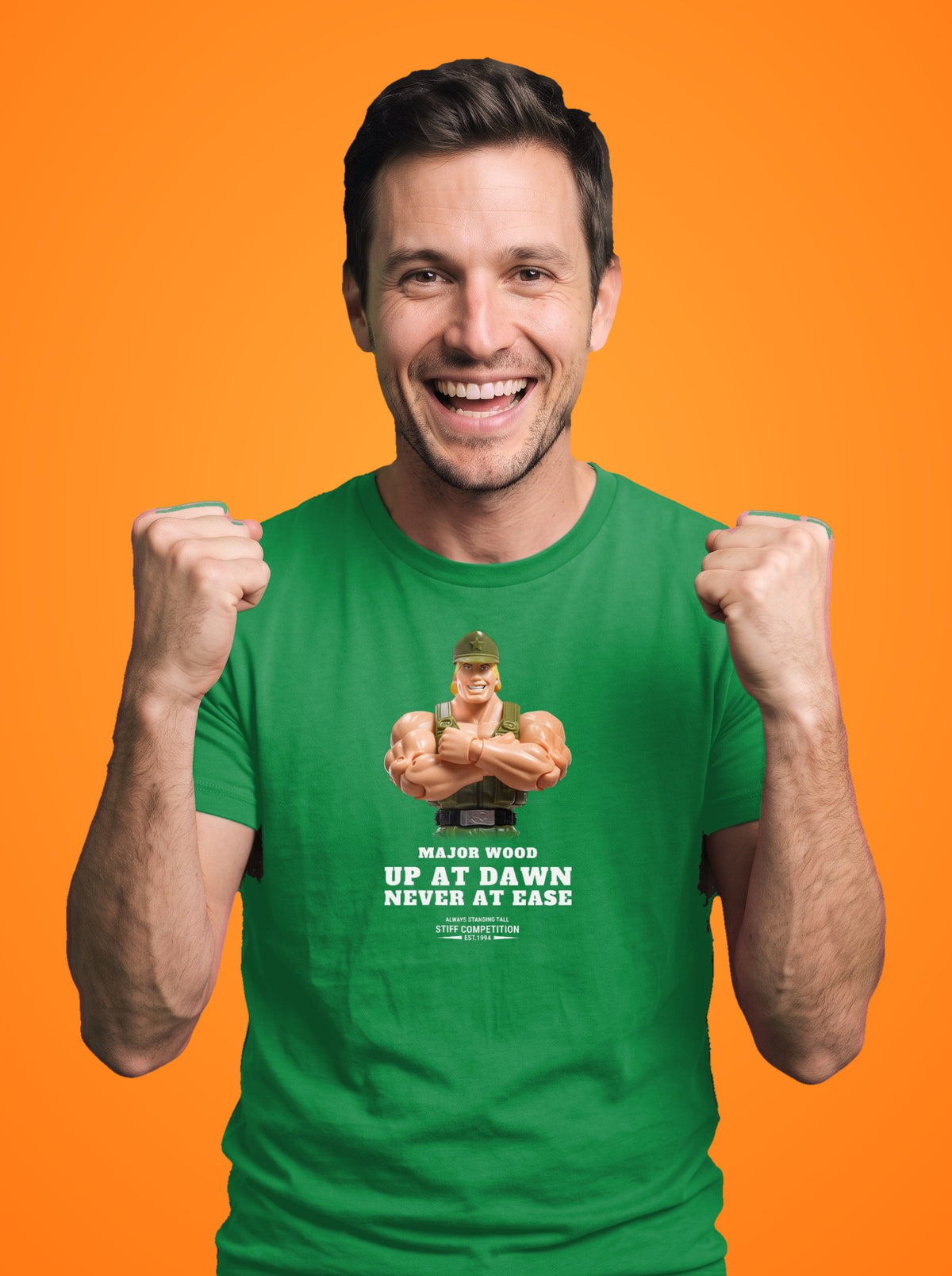 Man wearing the Major Wood Up At Dawn, Never At Ease t-shirt in Irish green