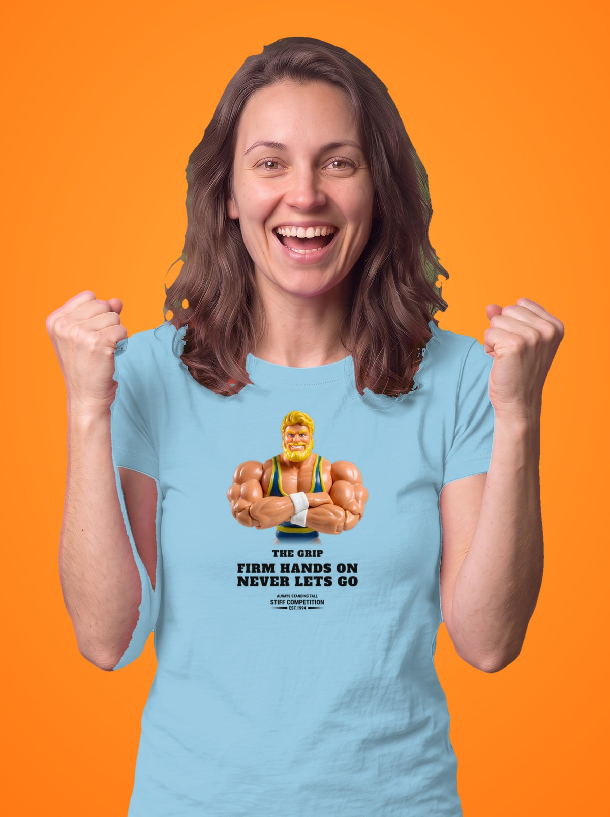 Woman wearing the Grip Firm Hands On, Never Lets Go t-shirt in light blue
