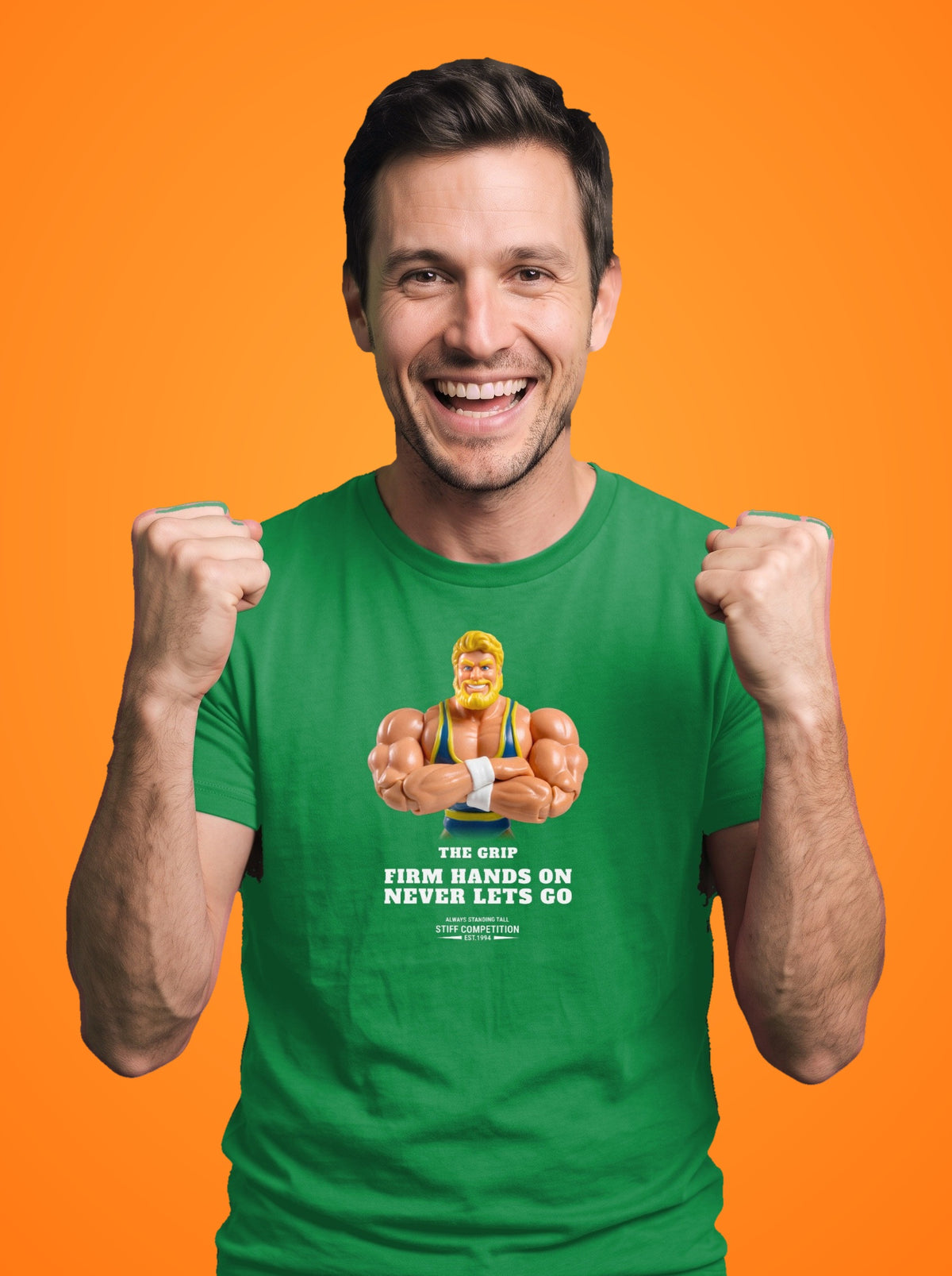 Man wearing the Grip Firm Hands On, Never Lets Go t-shirt in Irish green