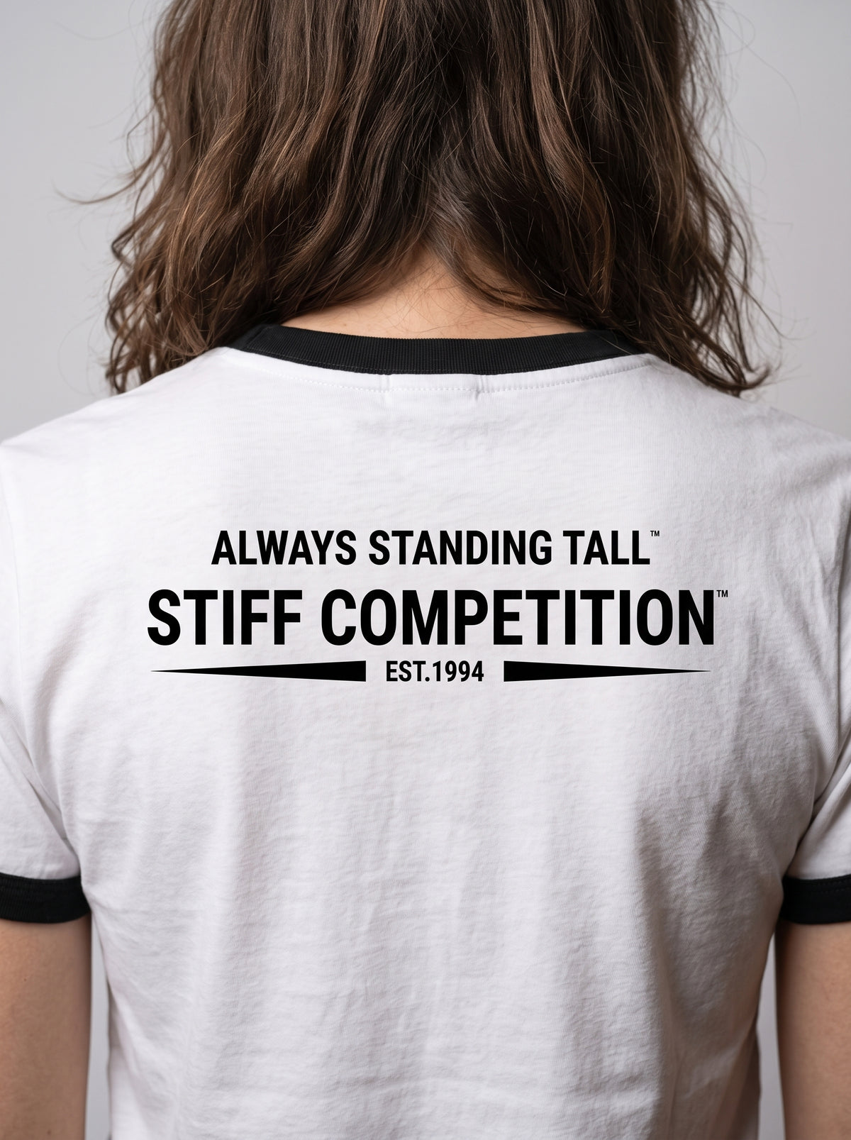 Close-up of the Always Standing Tall Stiff Competition back print on the ringer t-shirt