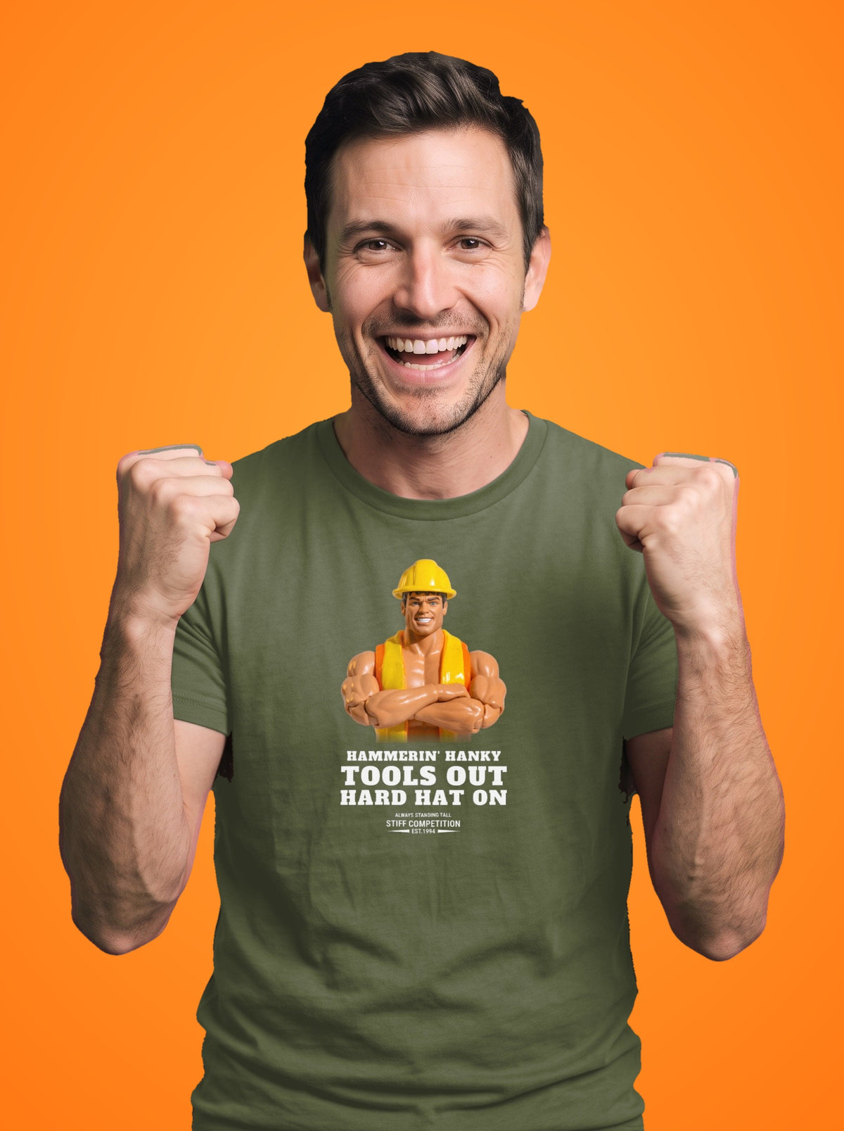 Man wearing the Hammerin' Hanky Tools Out, Hard Hat On t-shirt in military green