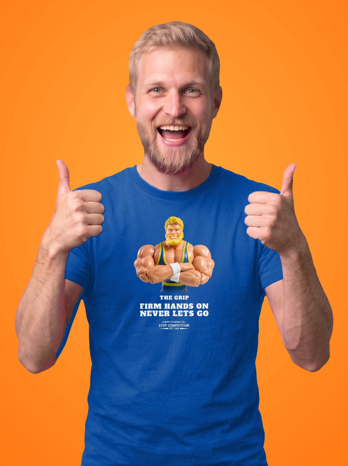 Man wearing the Grip Firm Hands On, Never Lets Go t-shirt in royal blue
